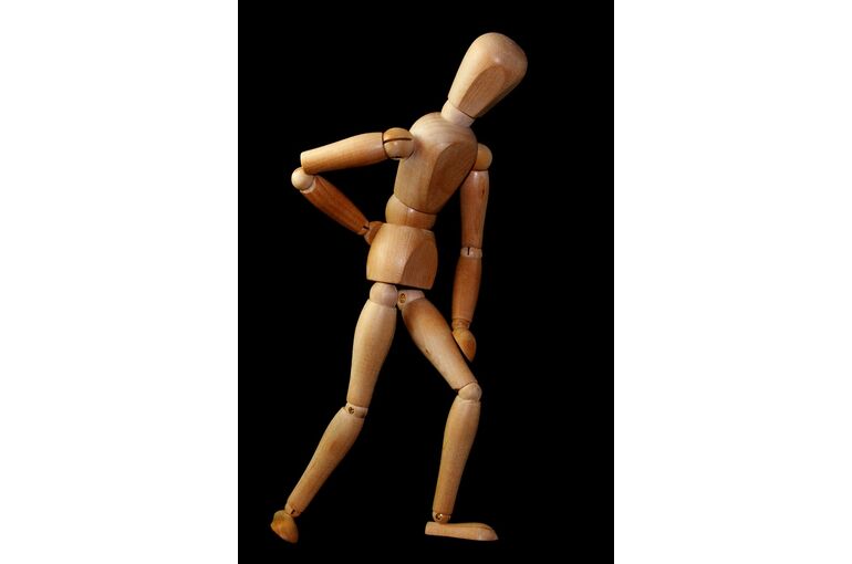 figure-man-stand-back-pain