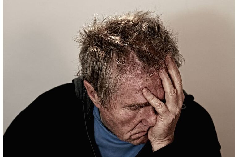 disappointed-elderly-facepalm-headache